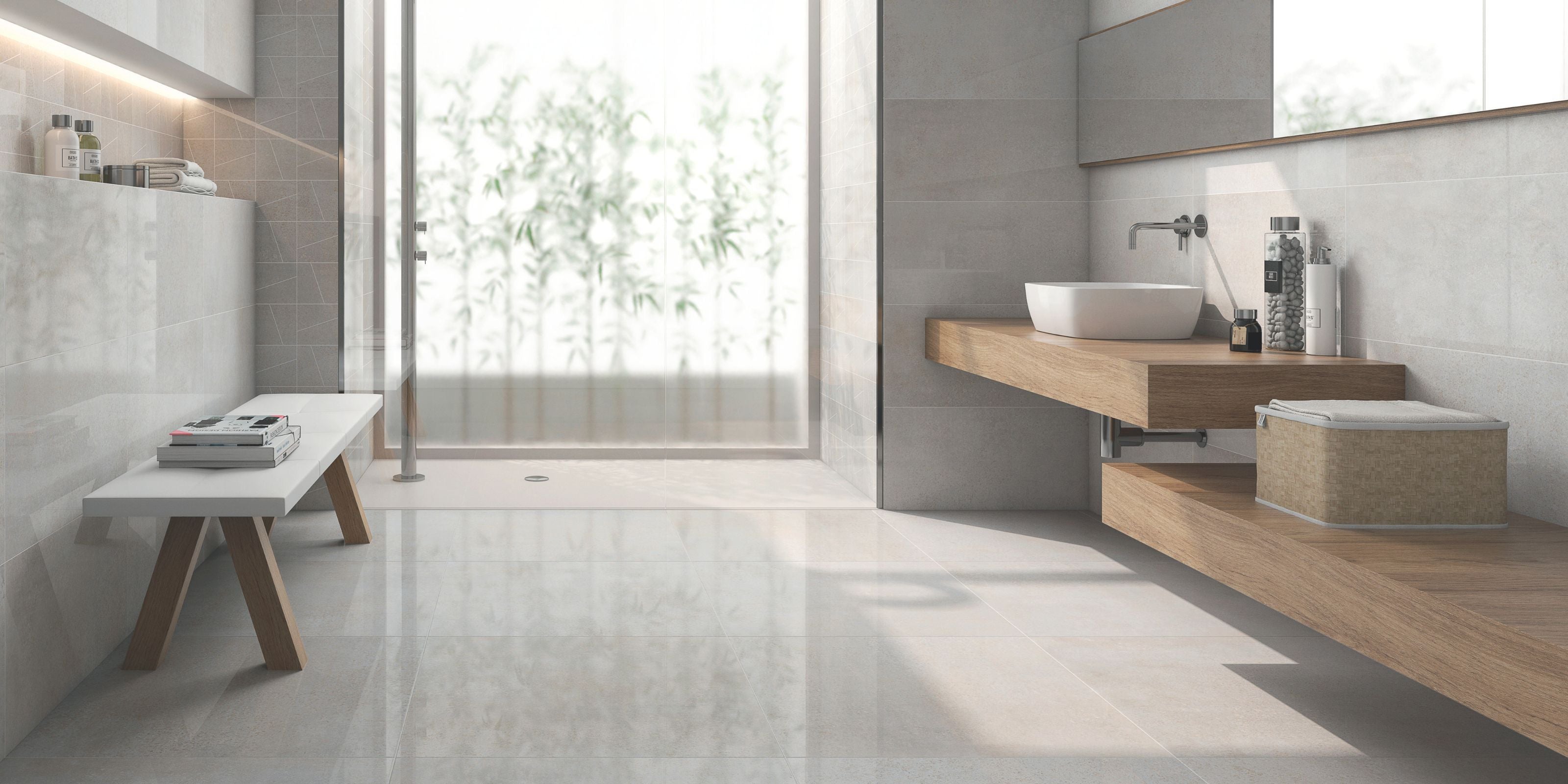 sleek modern bathroom with a calm atmosphere, polished grey stone effect prcelain floor tiles. matt grey stone effect porcelain wall tiles