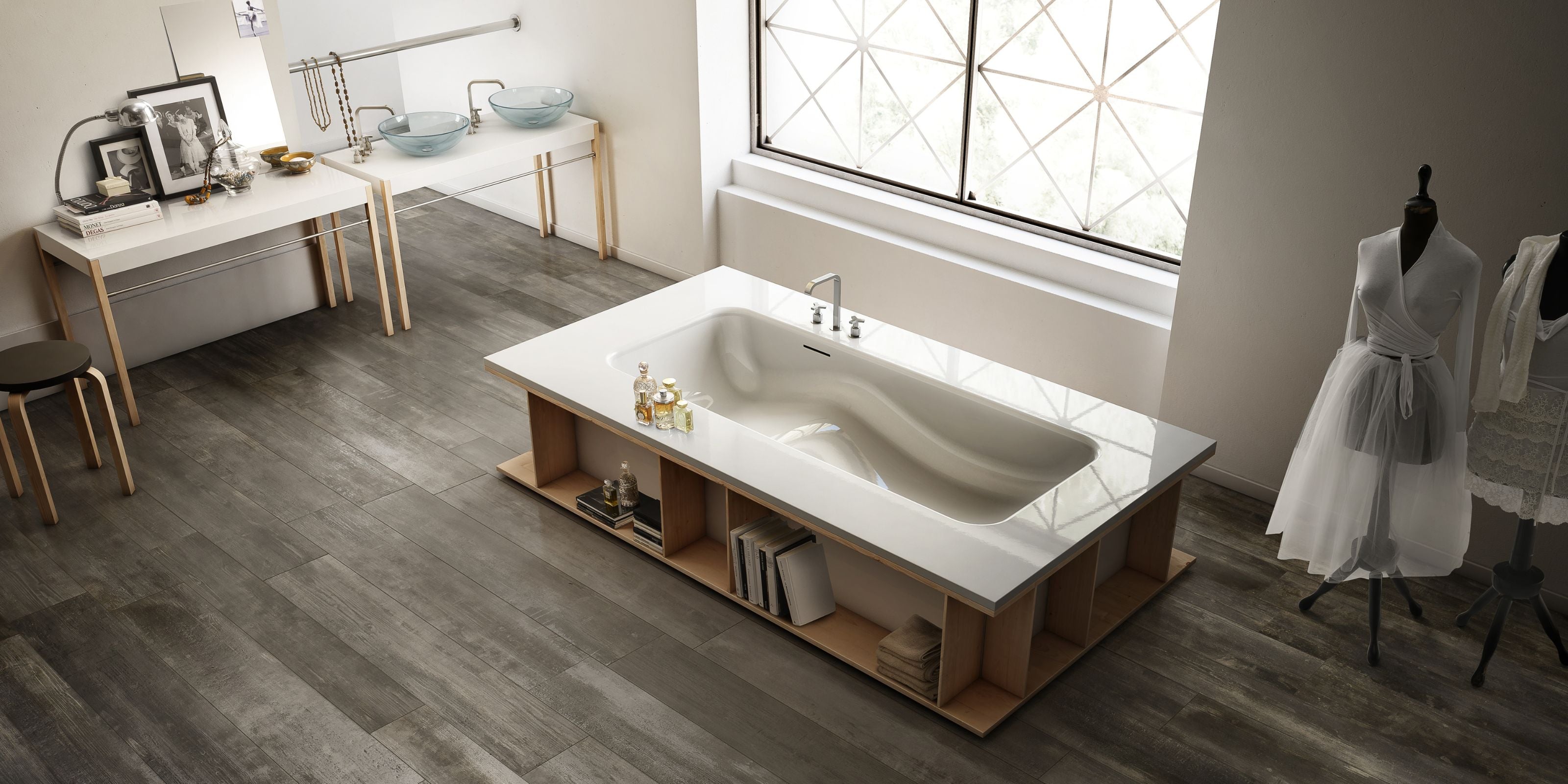 luxury spa-like bathroom with large freestanding bathtub and grey wood effect porcelain bathroom floor tiles