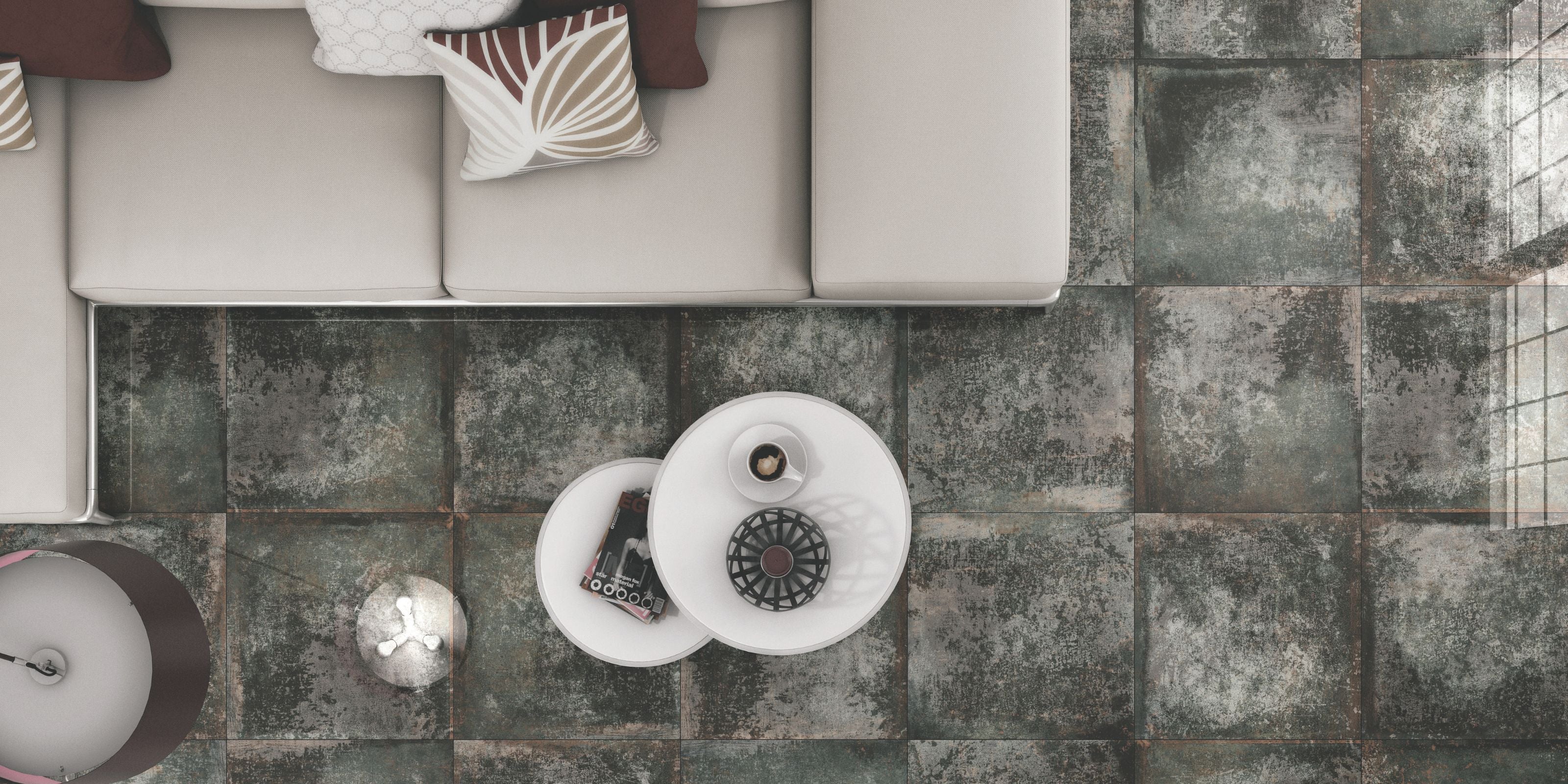 Top-down view of a living room with polished green stone effect porcelain floor tiles