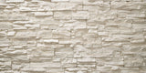 Close-up view of stacked stone cladding wall with natural white tones, showcasing detailed texture and pattern ideal for exterior and interior architectural design
