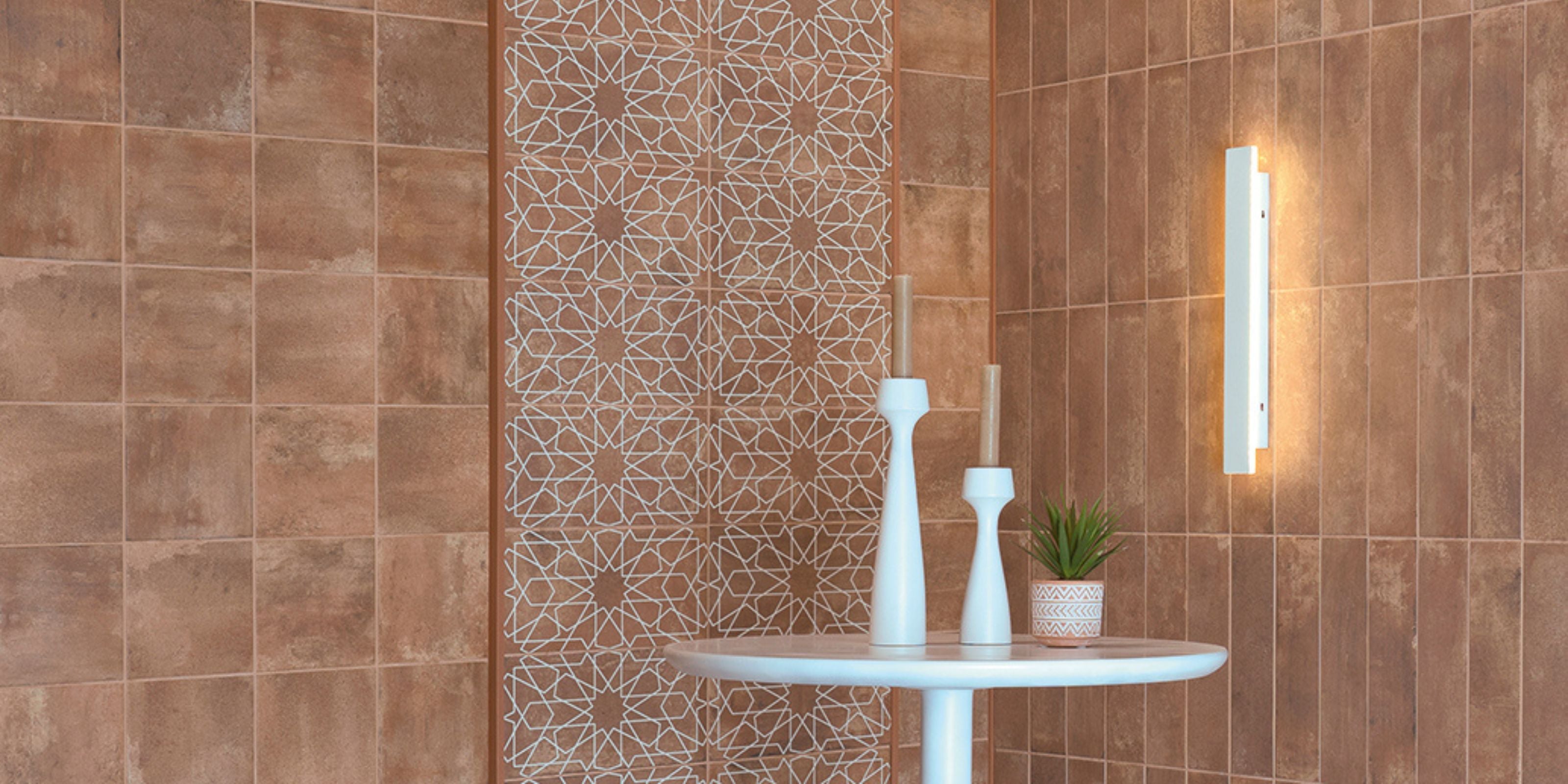 close up of the corner of a room where the walls are tiled with brown clay brick effect ceramic kitchen subway wall tiles