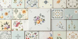 A collection of vintage kitchen wall tiles showcasing retro designs.