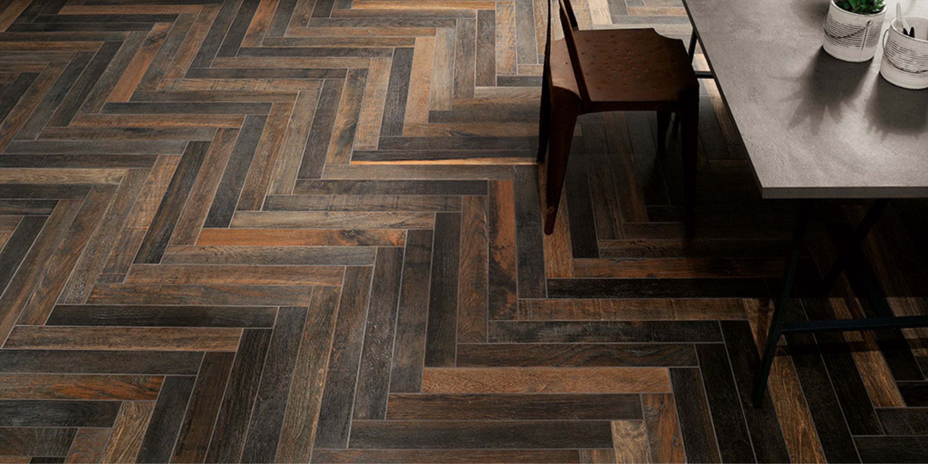 flooring, tiled with dark natural textured wood effect porcelain floor tiles in a herringbone pattern