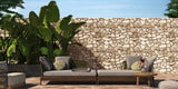 Outdoor pool area garden wall natural stonework cladding