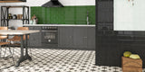 large retro kitchen with green subway tile splashback and white and grey star-patterned victorian floor tiles