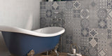 bathroom and bathtub with grey victorian patterned bathroom wall tiles