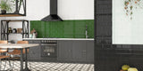 retro kitchen with black and white victorian patterned floor tiles and green subway splashback tiles
