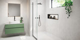 open airy baththroom with walk-in shower, large white stone effect porcelain bathroom shower floor tiles