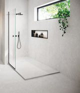 open airy baththroom with walk-in shower, large white stone effect porcelain bathroom shower floor tiles