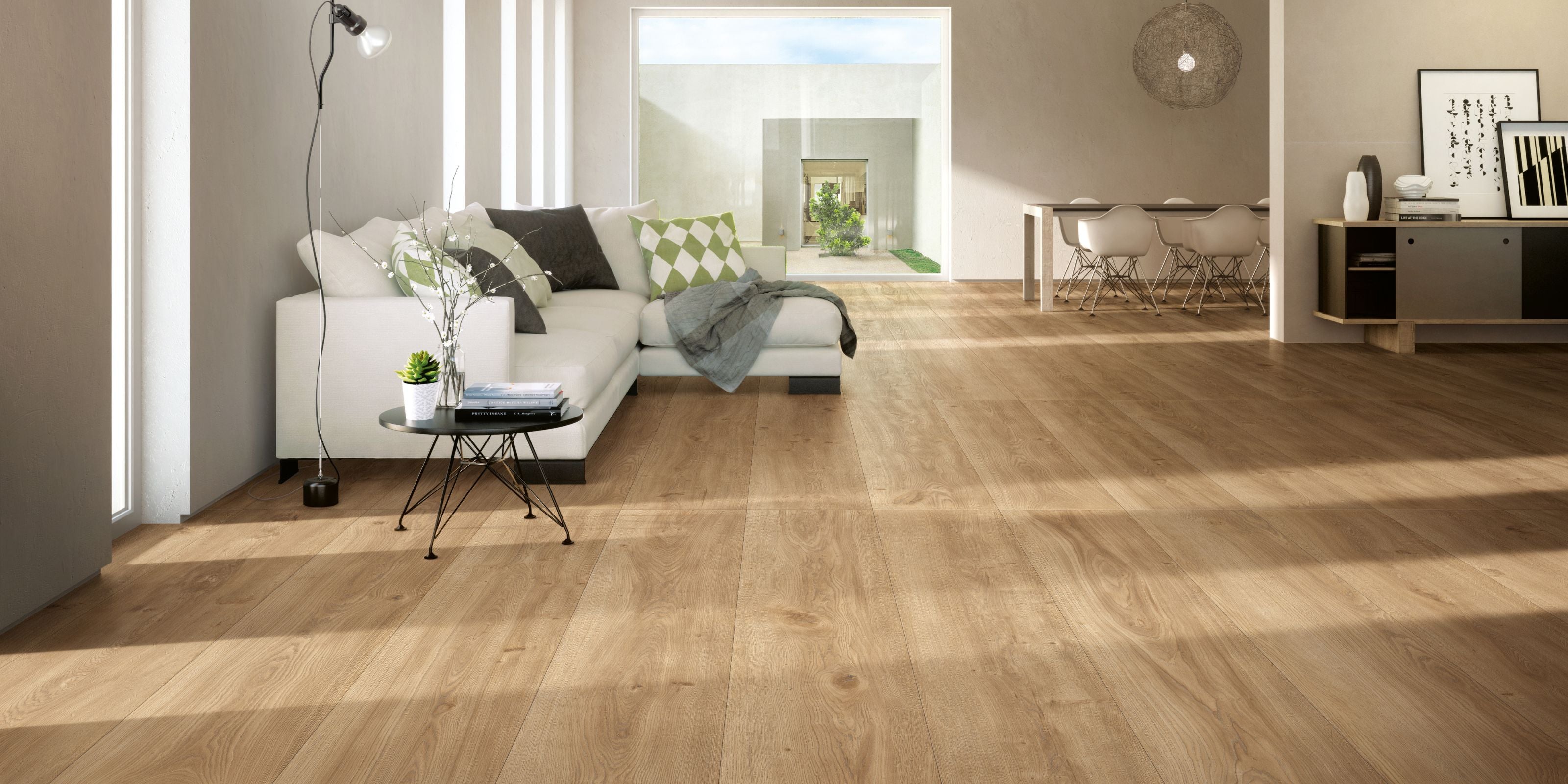 open-plan living room and dining area. floor tiled with natural stone effect porcelain floor tiles