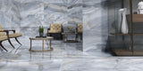 living room with blue onyx effect porcelain tiles covering the walls and floor