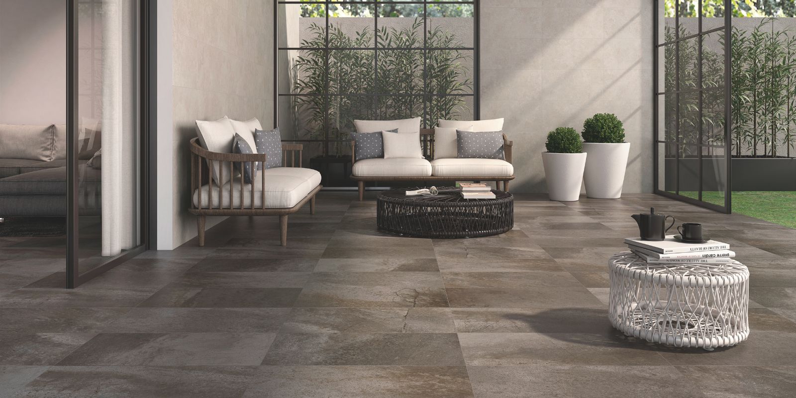 large open indoor living room with matt grey stone effect porcelain indoor floor tiles