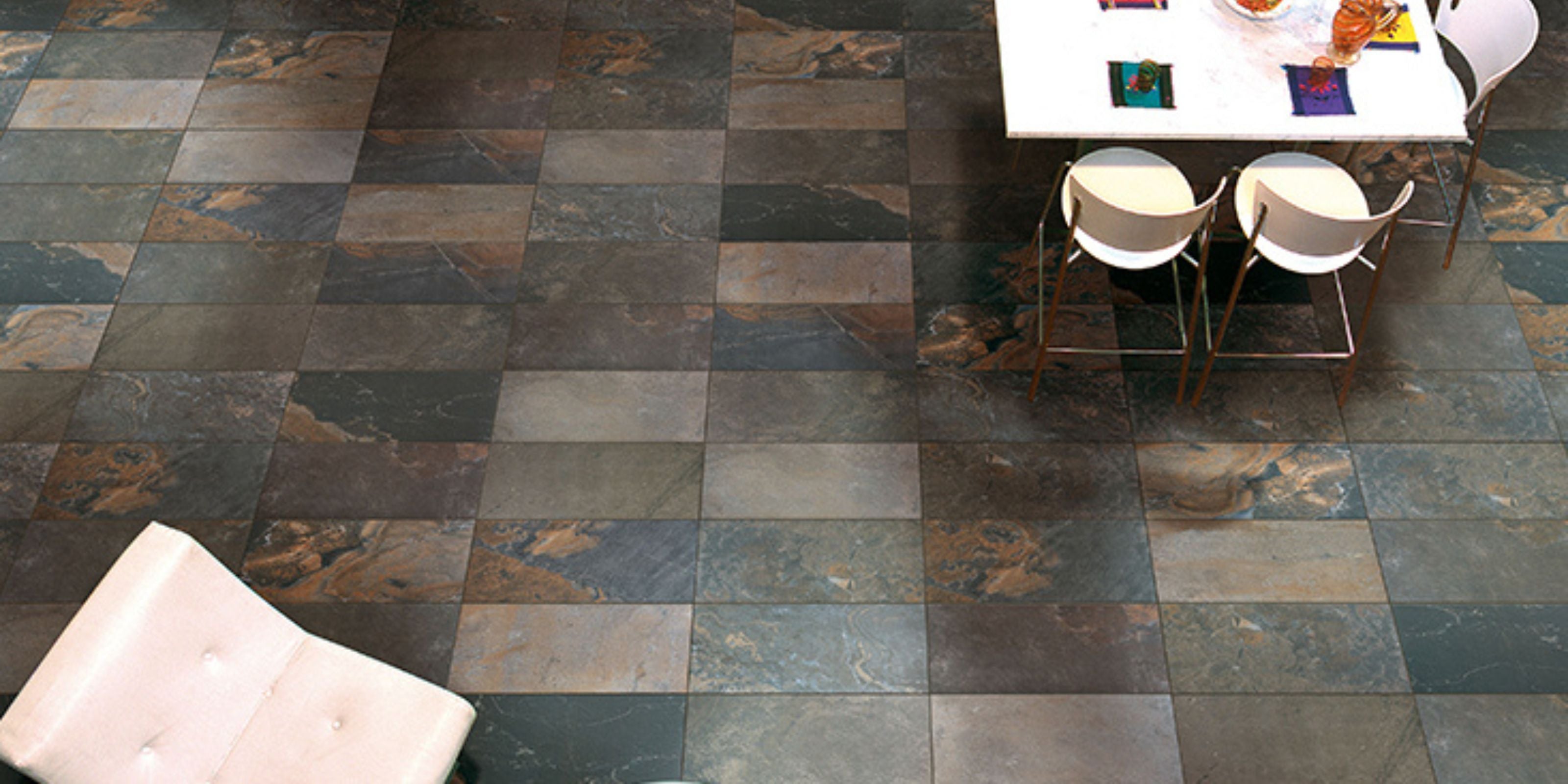 overhead view of a dining area with table and chairs, matt stone effect pocelain indoor floor tiles 30x60cm