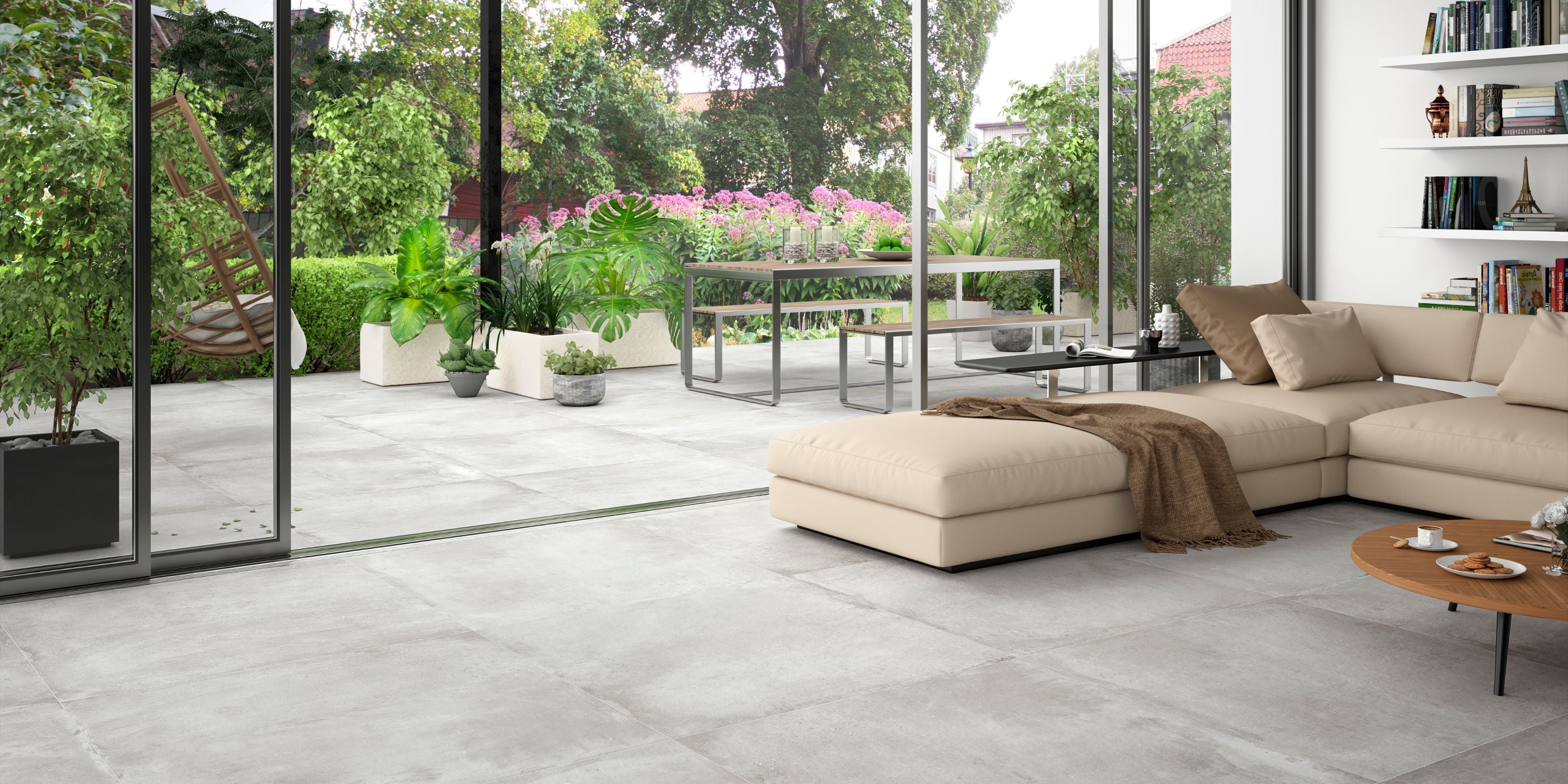 Light and Open Living Room with Sliding Glass Doors onto Patio, floor tiled with matt white concrete effect porcelain indoor/outdoor floor tiles 60x60cm