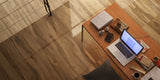 over head view of a home office with polished rich brown wood effect porcelain floor tiles