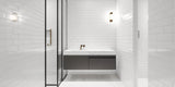 narrow bathroom with walk-in shower, walls fully tiled with white bathroom subway wall tiles