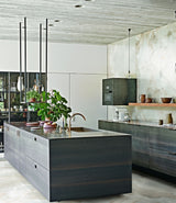 kitchen with large island and white pearl polished onyx effect porcelain kitchen floor and wall tiles